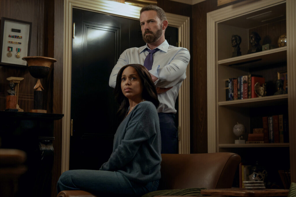 Kerry Washington seated with Ben Affleck standing behind her in an official still from Animals