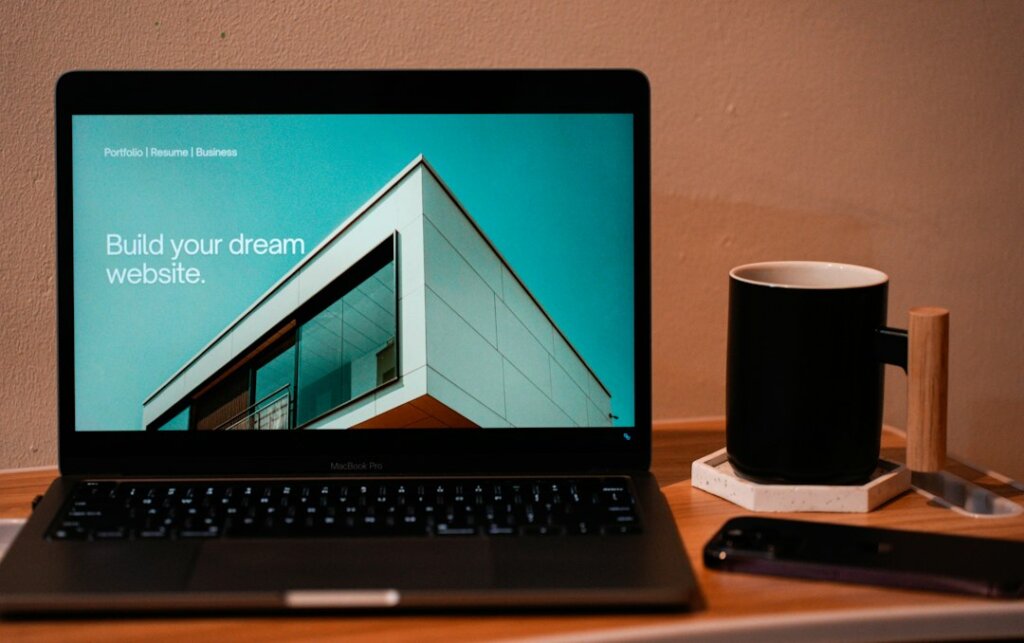 Laptop on a desk during website planning; featured image for the Elementor landing page evaluation guide
