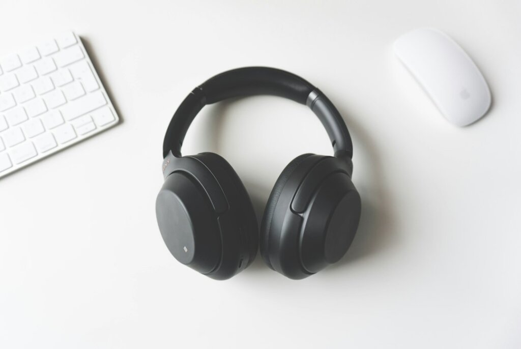 Headphones on desk illustrating Logitech wired headset